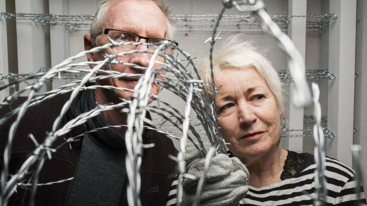 Artists Denise Higgins and Gary Smith working on the barbed maze installation, to show at Canberra Contemporary Art Space (CCAS) Gallery later this year.  Photo: Rohan Thomson