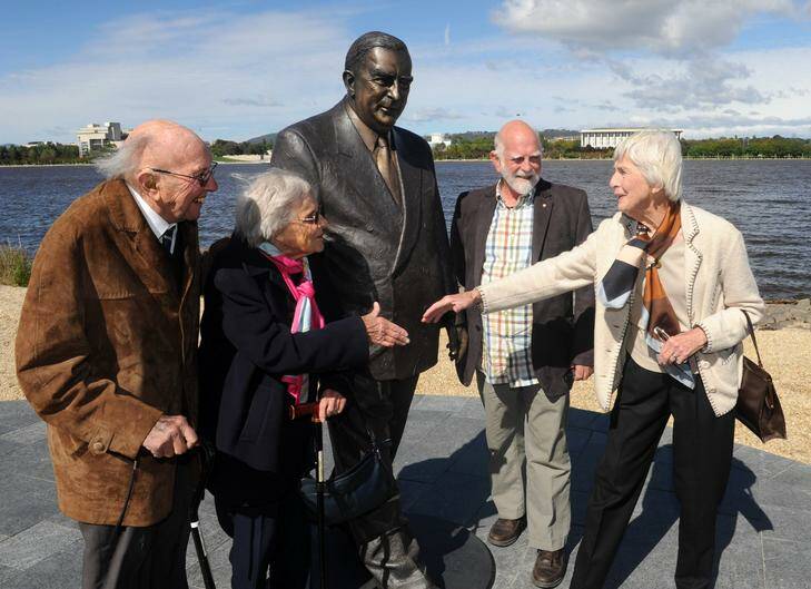 Sir Robert Menzies' daughter Heather Henderson and artist Peter Corlett with  Sir Richard and Lady Kingsland , at left, at the Sir Robert Menzies sculpture unveiling in Commonwealth Park. Sir Richard was a department head during the Menzies Government. Photo: Richard Briggs