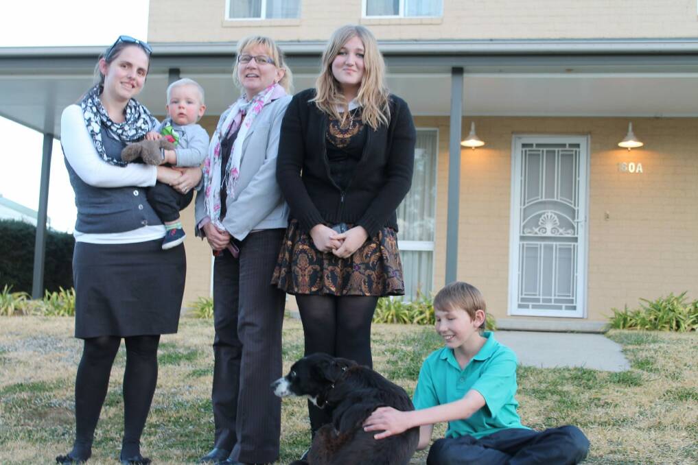 Laura Canty, left, with son Campbell, and Debbie Sibbick, third from left, with children Courtney and Benjamin Flack, are a few of the many Goulburn residents who travel to Canberra and Queanbeyan daily. 