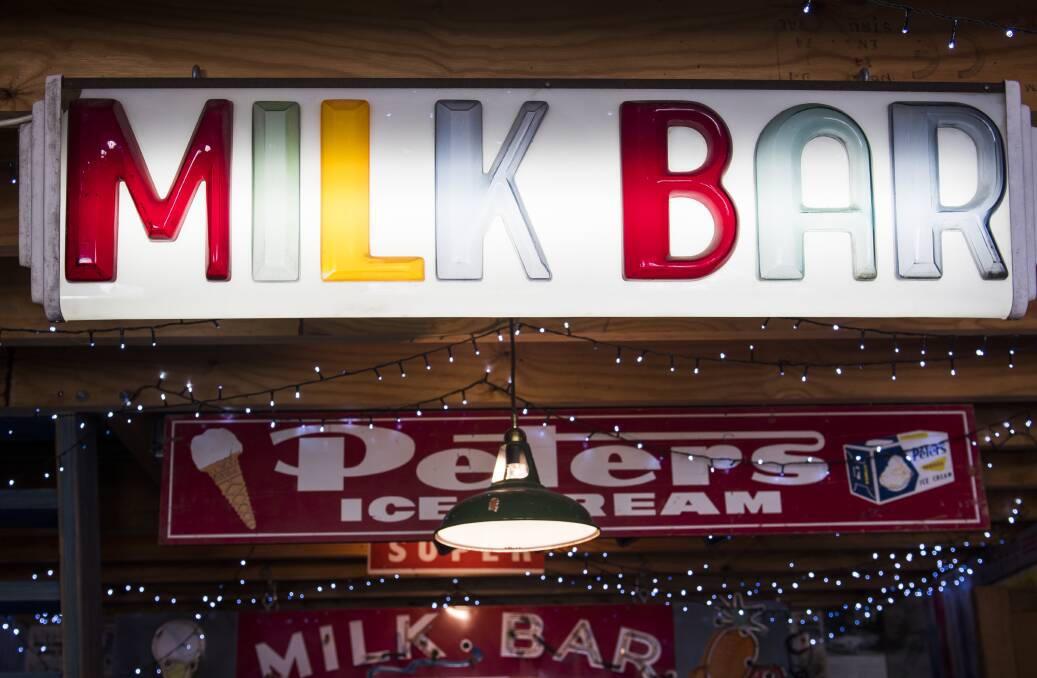 This sign is precious to Yianni - his family owned a milk bar in the NSW town of Wellington in the 1960s. Photo: Elesa Kurtz