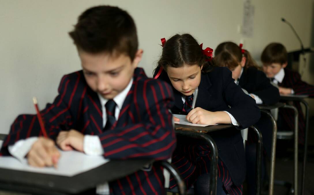 One study of "NAPLAN belly" found school students vomited, cried and stayed away from the tests. Photo: Pat Scala