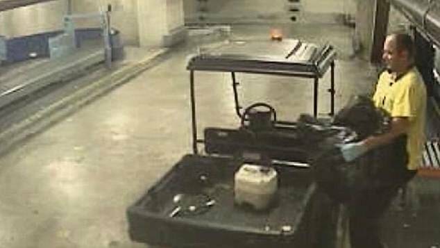 Maintenance worker Anthony Parker loading garbage bags full of cocaine at Sydney Airport Photo: NSW Police.