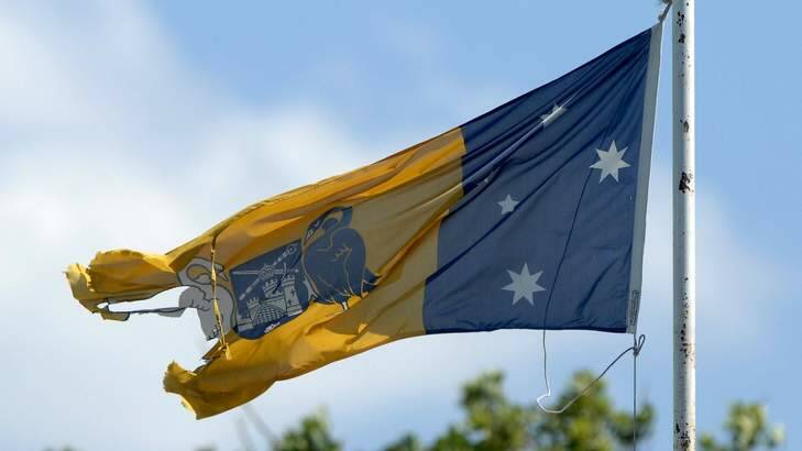 Worn out? The city of Canberra's coat of arms on the ACT flag. Photo: Graham Tidy