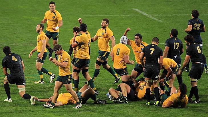 Ending Ewen McKenzie's horror start: The Wallabies celebrate beating Argentina at Patersons Stadium. Photo: Getty Images