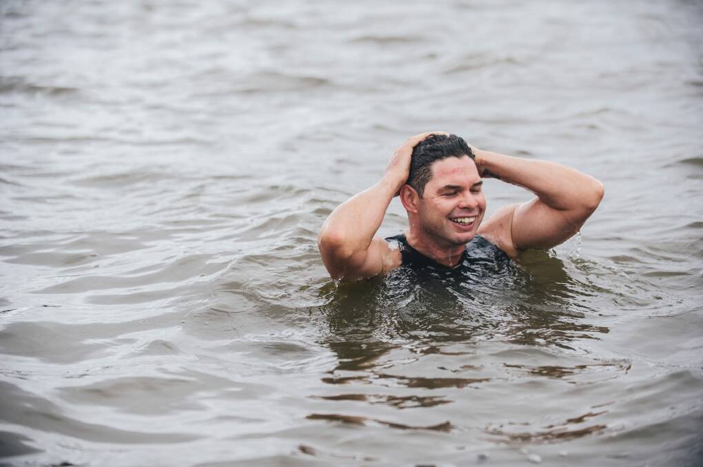 Triathlon ACT's Steve Hough enjoys the water at Lake Burley Griffin. Photo: Rohan Thomson