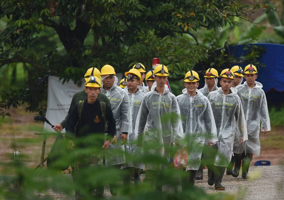 Thai army soldiers return from Tham Luang cave on day three of the rescue operation.  Photo: Kate Geraghty 