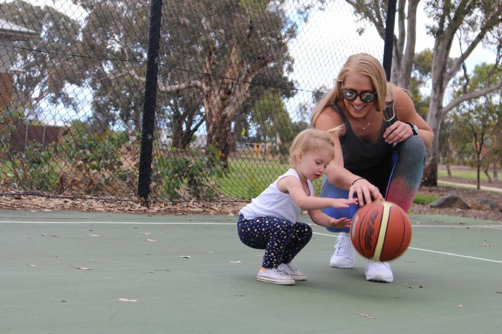 Abby Bishop will make her Australian Opals comeback after putting her international career on hold last year to care for neice Zala, 2. Photo: Supplied