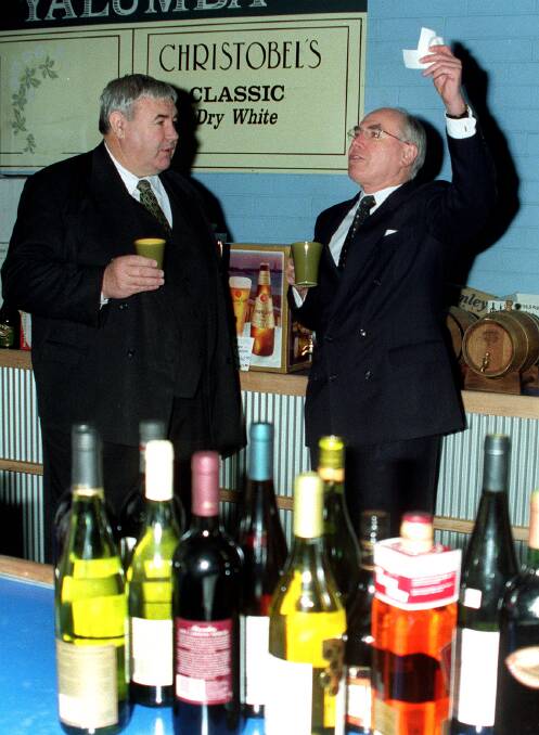 Jim Murphy and Prime Minister John Howard in 2000.  Photo: Peter Wells