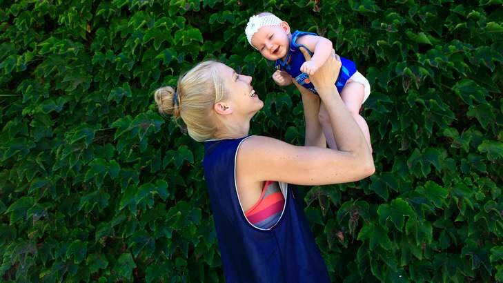 Canberra Capitals star Abby Bishop with her five-month-month old niece Zala. Photo: Katherine Griffiths