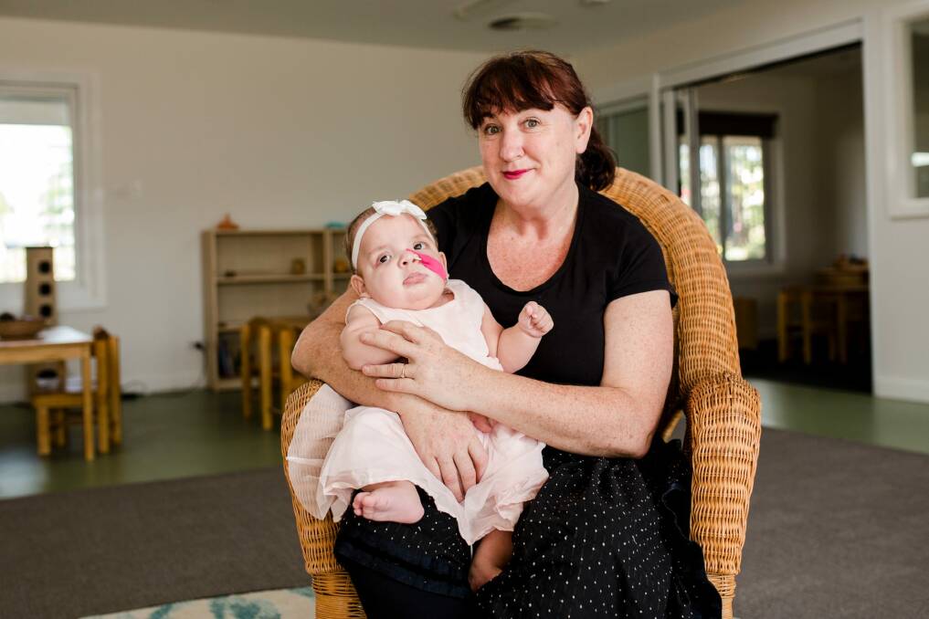 Stella Bella Children's Centre  director Suzanne Tunks in the new centre at Fyshwick with Arcadia Williams, 10 months, of Queanbeyan, who will use a respite centre which is also part of the centre. Photo: Jamila Toderas