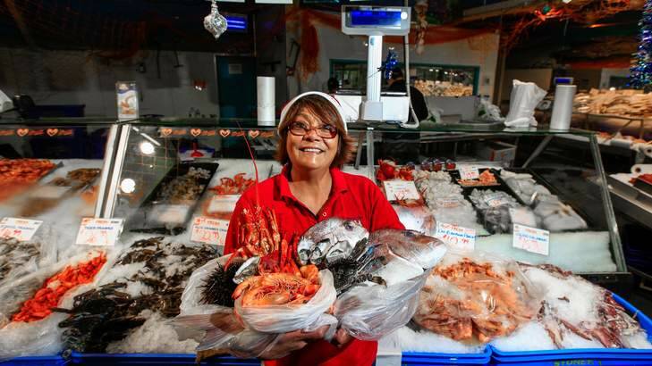 Rhodora Butterwordh of FishCo Fish Market at the Belconnen Fresh Food Markets. Photo: Katherine Griffiths