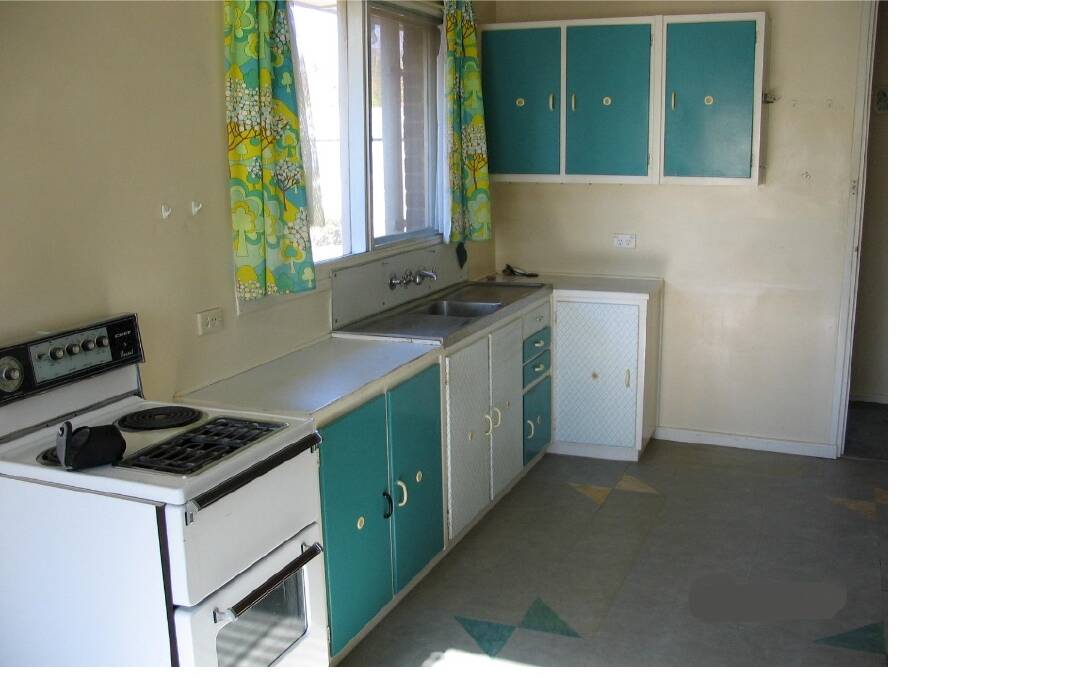 An ageing kitchen in Canberra's public housing. Photo: Supplied ACT Government