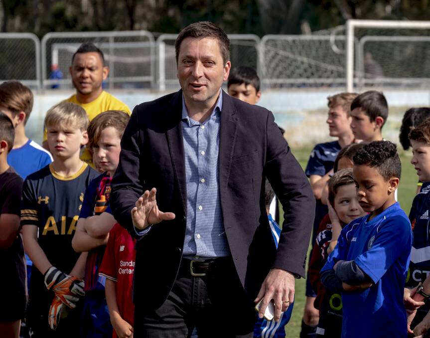 Opposition Leader Matthew Guy at a soccer clinic on Sunday. Photo: Luis Ascui