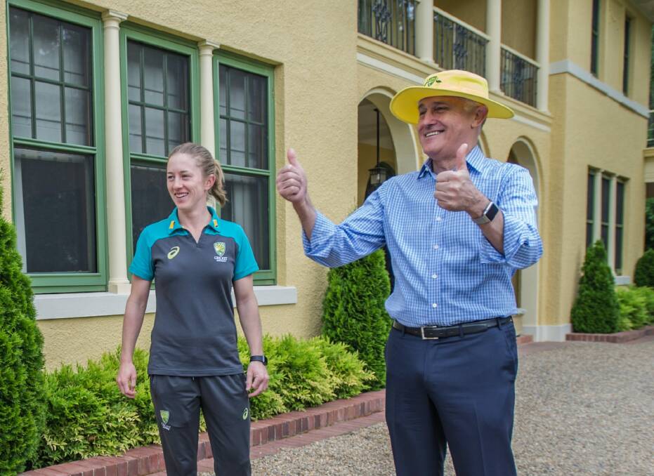 Malcolm Turnbull celebrates with the Australian women's cricket team on Wednesday after their Ashes win. Photo: Karleen Minney
