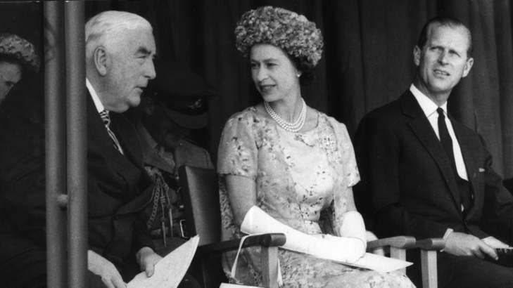 Prime minister Robert Menzies sits with the Queen and Prince Philip at Canberra's 50th anniversary celebration during her second royal visit.