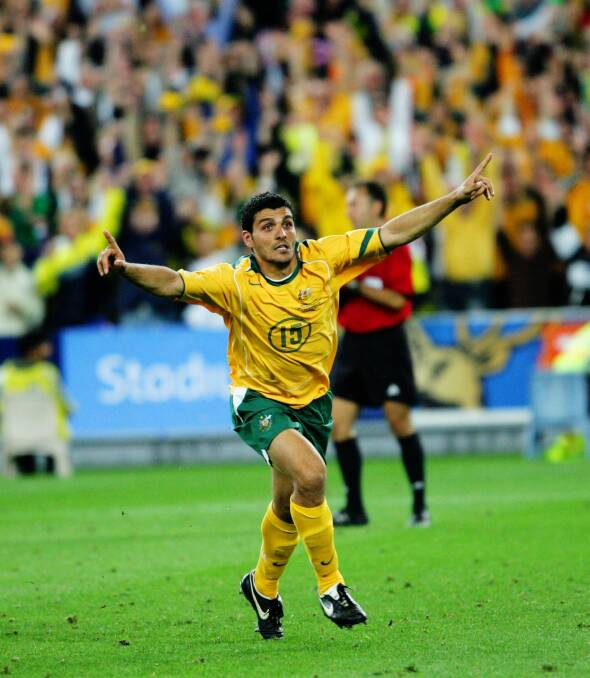 Iconic moment: John Aloisi celebrates scoring the goal that sent the Socceroos to the World Cup. Photo: Vince Caliguiri