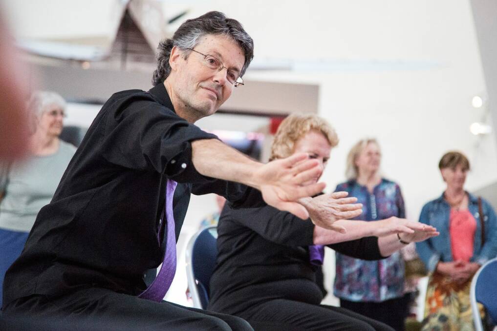Philip Piggin with a Dance for Parkinson's group at Belconnen Arts Centre. He has been a major player in the growth of dance programs for people of mixed abilities. Photo: Lorna Sim