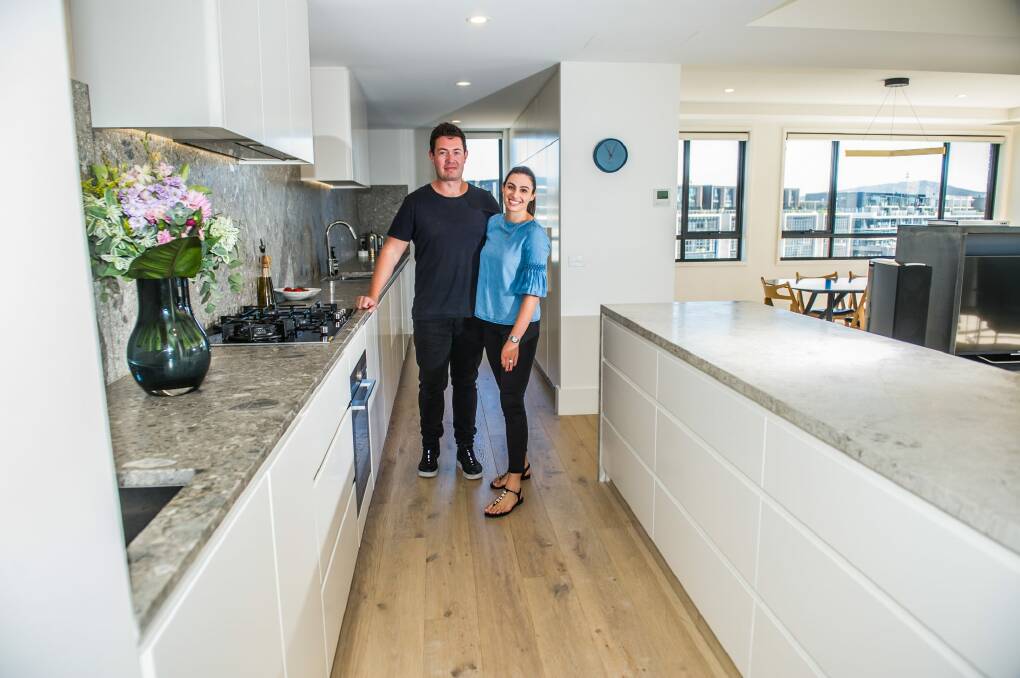 Developer Matt James, of Crafted with fiancee Annie Moses in their kitchen which is no short of bench or storage space.   Photo: Karleen Minney