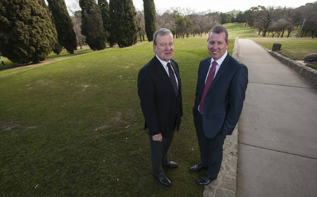 Royal Canberra Golf Club general manager Andrew Casey and president Mac Howell prepare for the major refurbishment of the club's course. Photo: Elesa Kurtz