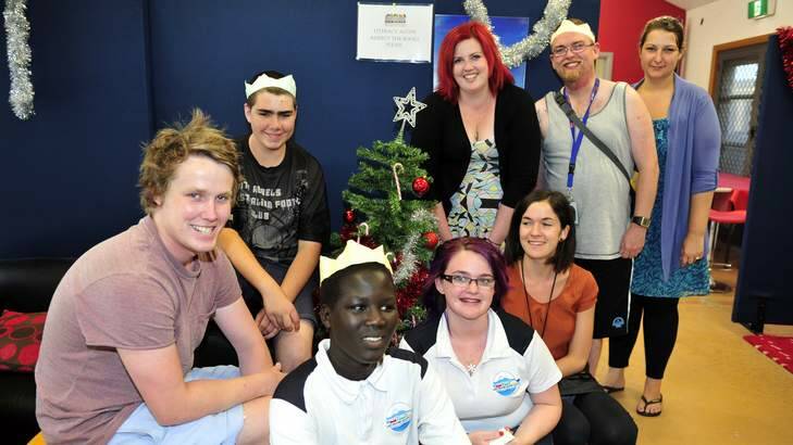 Benjamin Kane, Callan McPherson, Jok Nhial, Brenny Lodding, Madison Parrott, Alexis McNeice, Andrew Collins and Rebecca James enjoying the Christmas party at the Lanyon Youth and Community Centre.. Photo: Jay Cronan