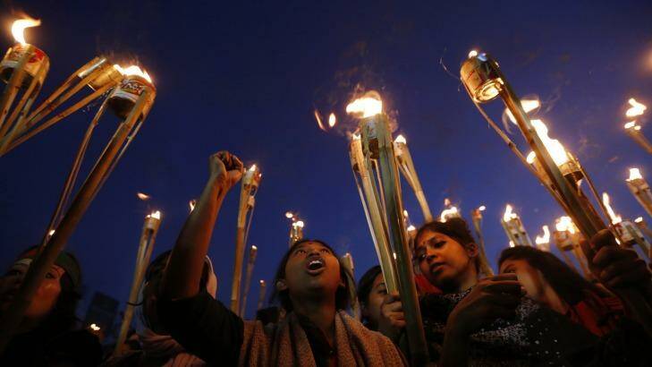 People take part in a torch-lit rally as they celebrate after the Supreme Court rejected Abdul Quader Mollah's request for an appeal against his death sentence in Dhaka. Photo: Reuters