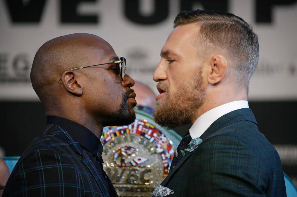 Floyd Mayweather (left)  and Conor McGregor pose better than actual models.  Photo: AP