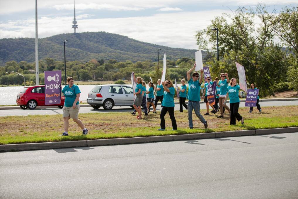 Canberra's childcare workers walked off the job and did a 'honkathon' on Commonwealth Avenue. Photo: Jamila Toderas