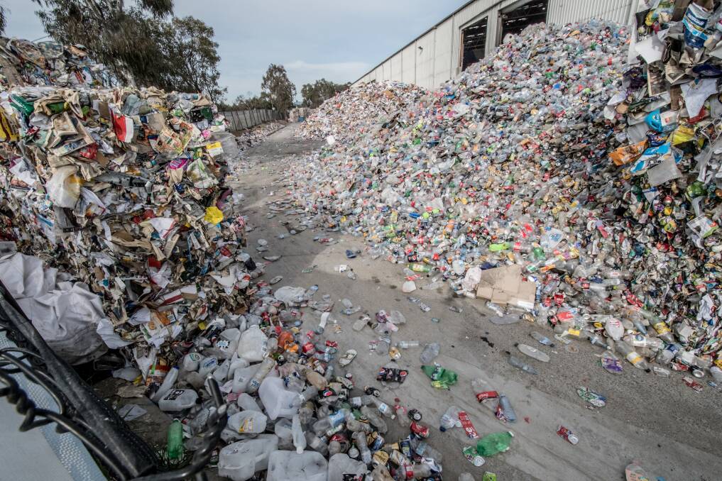 More rubbish piled up against the sheds at the Hume recycling centre. Photo: Karleen Minney
