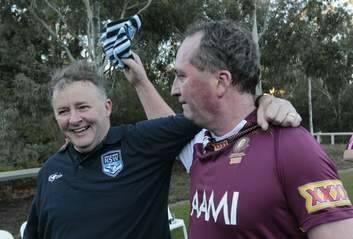 Barnaby Joyce tickles Deputy Prime Minister Anthony Albanese after a State of Origin touch rugby match at Parliament House. Photo: Andrew Meares