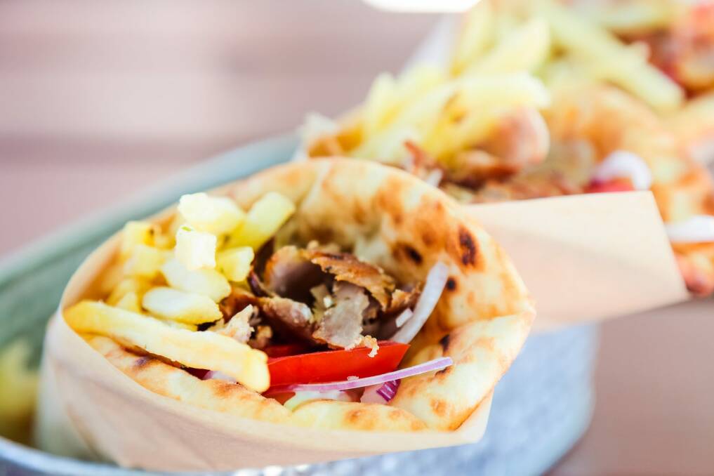 Portion of Gyros pita, traditional Greek fast food. Gyros Yiros pita generic?Stock image iStock Photo: Dejan Kolar