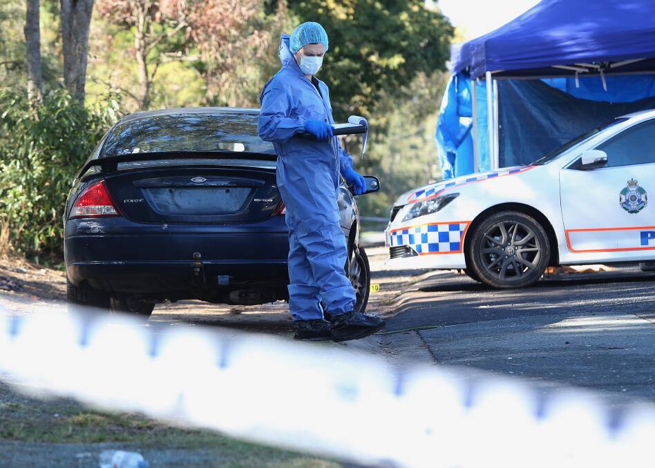 Police attend a crime scene where the man died from stab wounds at Murrumba Downs. Photo: AAP/Jono Searle