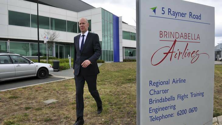 Sebastian Hams, Executive Director of KordaMentha, the company acting as the receiver for Brindabella Airlines, leaves the building after a meeting with staff on Monday morning. Photo: Graham Tidy