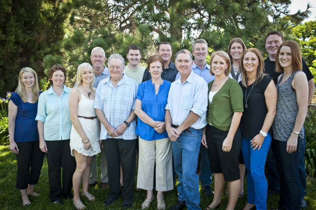Brendan Maher (second from right) with his very large Canberra family. Parents Peter and Maree (centre) have 13 children. Photo: Supplied
