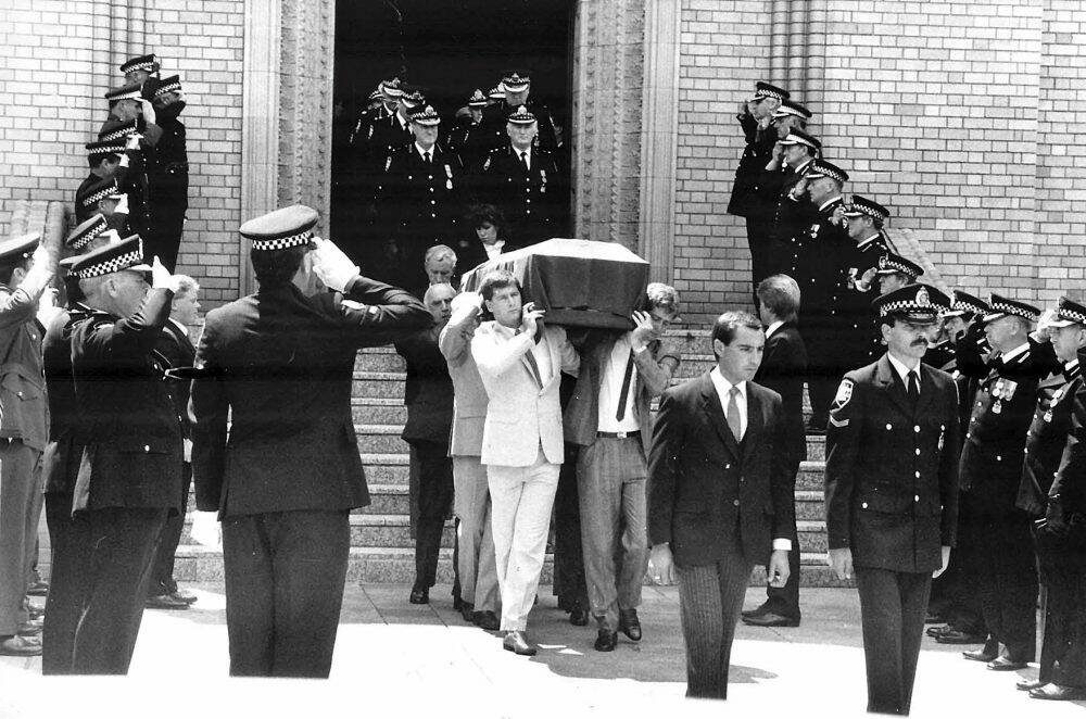 Assistant Commisioner Colin Winchester's funeral at St. Christopher's cathedral in Manuka,1989. Photo: AFP Museum