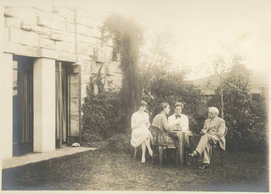Walter Burley Griffin and Marion Griffin in their garden at Castlecrag with architect Louise Lightfoot and Walter's father George. Photo: National Library of Australia