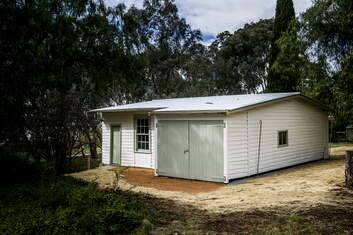 AS NEW: The buggy shed, now restored, was once used as a cottage for migrants. Photo: Rohan Thomson