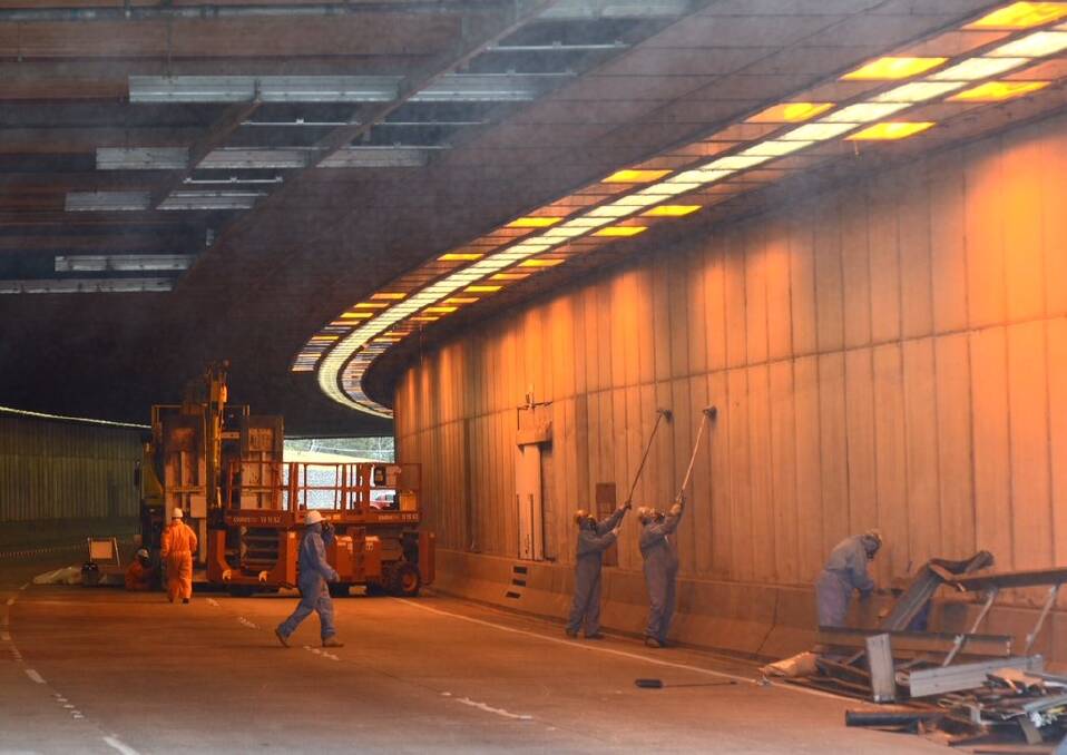 Cleaning in the Parkes Way tunnel to ensure no asbestos contamination. Photo: Emergency Services Agency