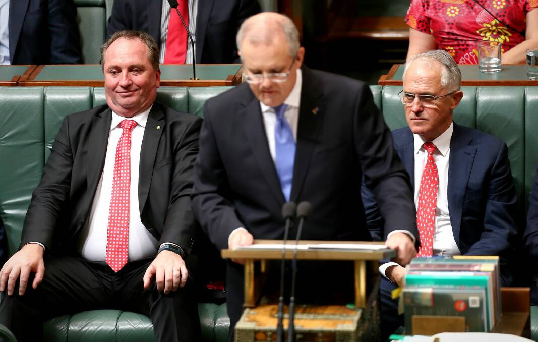 Barnaby Joyce, Scott Morrison and Malcolm Turnbull have all sung from the same songsheet on Monday in calling for Bill Shorten to sack Sam Dastyari. Photo: Alex Ellinghausen