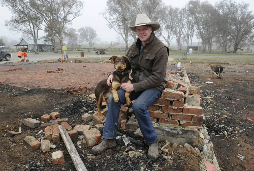 Craig Starr, with dog Jenny, at Gold Creek Station, Hall, on the site of the tourist function centre that was destroyed by fire. Photo: Graham Tidy
