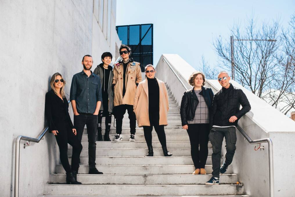 Commercial residents of the new Nibu and Palko buildings on Londsdale St Braddon. (L-R) Alex Howes and John Bruyn of Bitten Goodfoods, Chloe Kim and Lucas Choi of Koji Collection, Ingrid Penc of Kin Gallery and Brian Tunks of Bison Home. Chloe Kim and Lucas Choi of Koji Collection, John Bruyn and Alex Howes of Bitten Goodfoods, Leilani Fox of Hey Kuya, Ingrid Penc of Kin Gallery, and Brian Tunks of Bison Home. Photo: Rohan Thomson