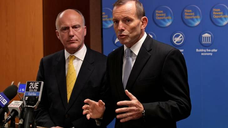 Tony Abbott (right) and his public service minister Eriz Abetz (left) spruiked 'pay flexibility' but weren't really fans of it. Photo: Dallas Kilponen