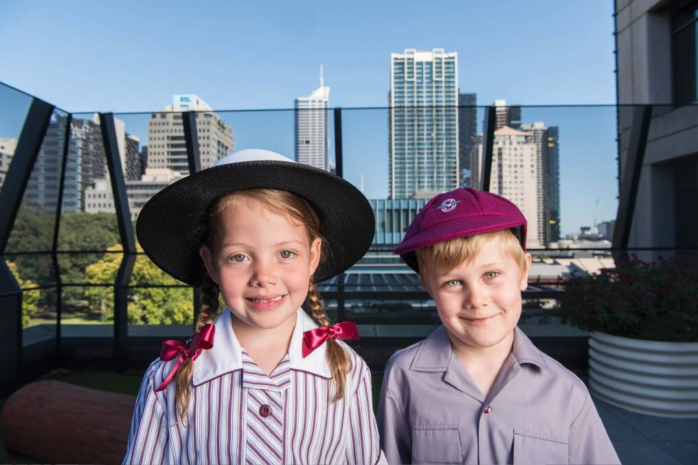 Prep students Amali Melville and Tate Verhagen on the roof of Melbourne's first vertical school Haileybury, which opened this year. Photo: Josh Robenstone