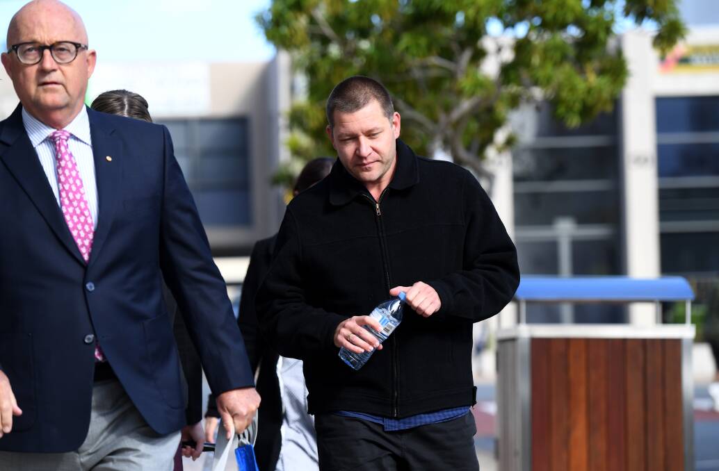 Thunder River Rapids Ride operator Peter Nemeth (right) and his lawyer Ralph Devlin QC arrive for the inquest into the Dreamworld disaster. Photo: AAP