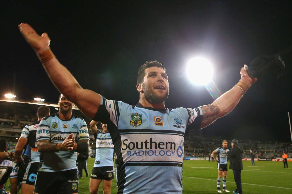 Michael Ennis celebrates the upset victory but didn't endear himself to Raiders fans. Photo: Getty Images