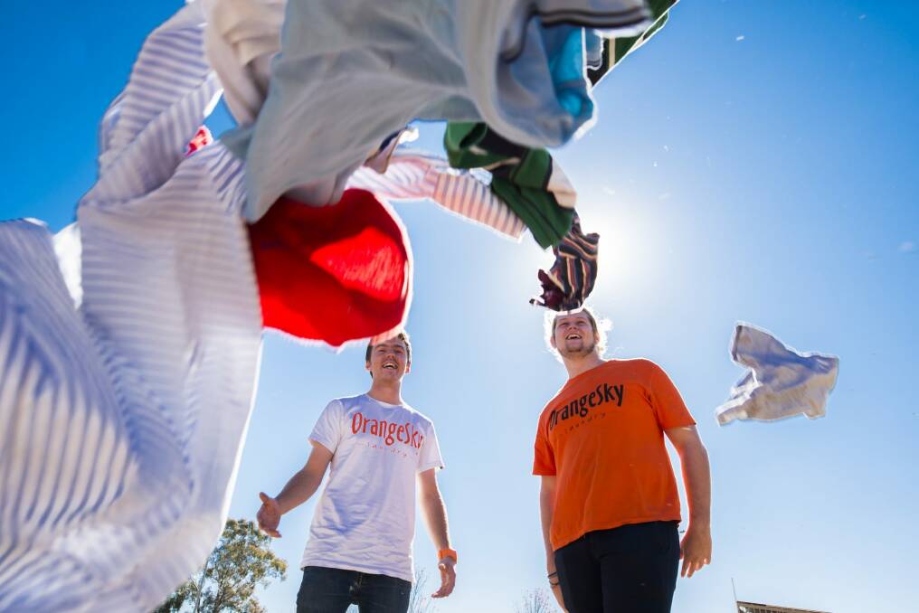 Orange Sky Laundry founders and 2016 Young Australians of the year, Nic Marchesi and Lucas Patchett, prepare for the launch of their first Canberra van. Photo: Rohan Thomson