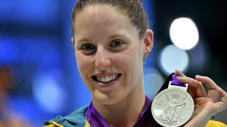 Australia's Alicia Coutts holds her silver medal during the women's 200m individual medley victory ceremony at the London 2012 Olympic Games. Photo: Reuters