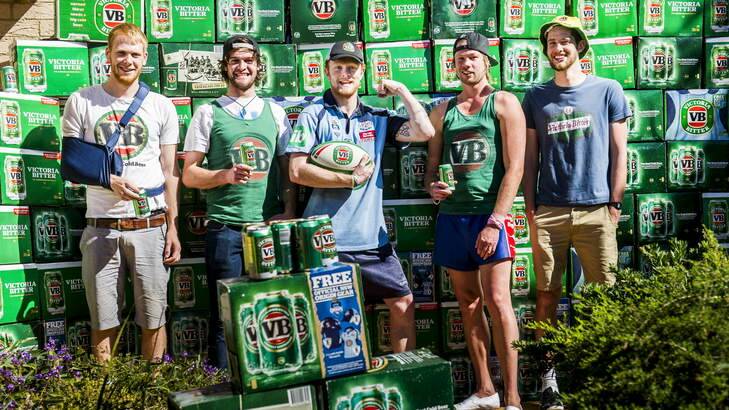 Peter Whatman, 21, Doug Da Roza ,19, Nathaniel Woods, 22, Gerard Ogden, 25, and Tristan Dewick, 22, with some of more than 10000 VB cans that they have collected to build a 'can house'. Photo: Rohan Thomson
