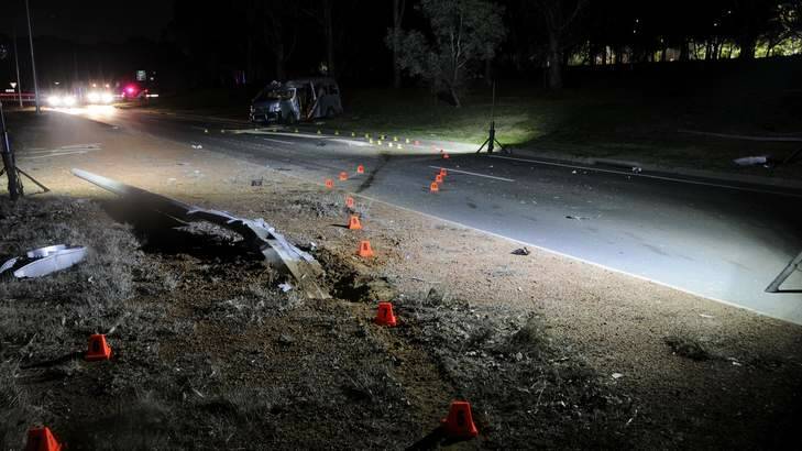 The scene of a crash which left a 24-year-old taxi passenger in a critical condition on Saturday night. Photo: Supplied by ACT Policing