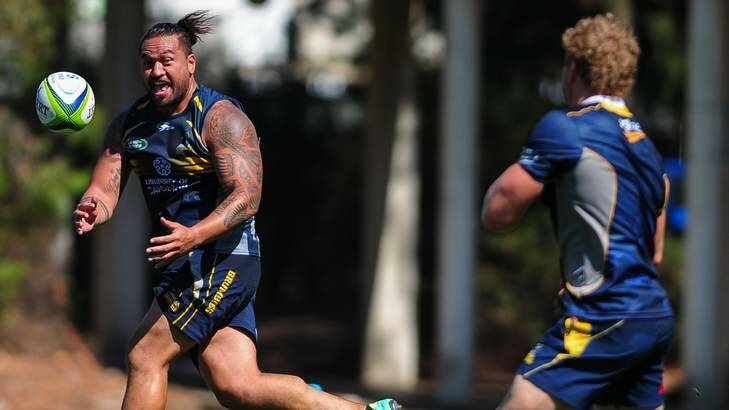 Fotu Aeulua on the charge at Brumbies training on Thursday. Photo: Katherine Griffiths