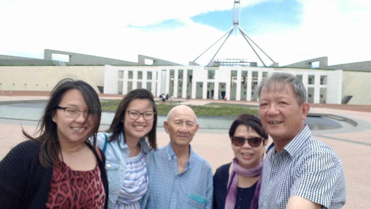 The Nguyen family, including grandpa, Hien Nguyen, visit Han in Canberra. Photo: Supplied